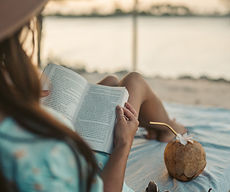 Explorer reading ancient cosmic documentation